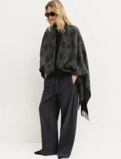 Poncho jacquard con frange - NERO