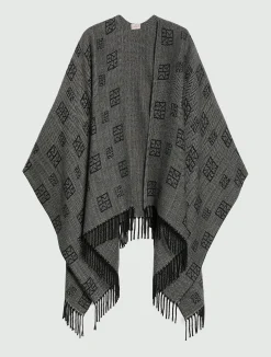 Poncho jacquard con frange - NERO